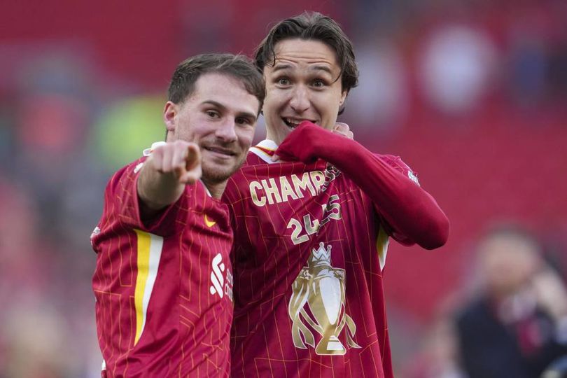 Alexis Mac Allister (left) and Federico Chiesa celebrate Liverpool Premier League title triumph after defeating Tottenham. (c) AP Photo/Jon Super